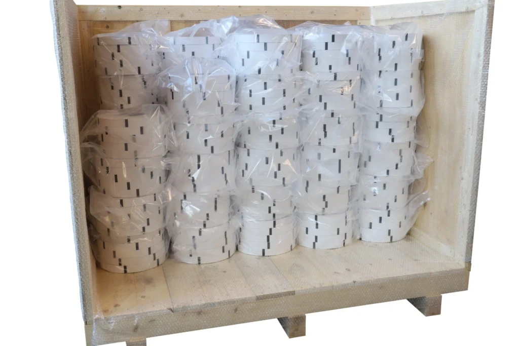 Printed banknote bands loaded and stacked in a seafreight wooden box